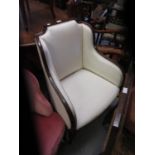 Late 19th / early 20th Century mahogany wing shaped armchair having white damask upholstery,