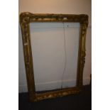 19th Century rectangular swept gilt picture frame, aperture 40ins x 26ins