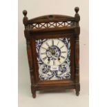 Late 19th Century walnut cased two train mantel clock with blue and white ceramic dial, signed