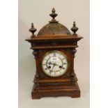 Late 19th Century German oak two train mantel clock Currently runs and strikes correctly 20ins high