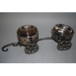 Silver plated twin bottle coaster carriage cast with grapevines