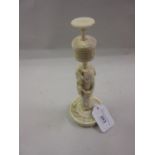 19th Century Chinese carved ivory puzzle ball stand in the form of a standing Immortal on a circular