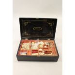 19th Century Chinese export lacquer games box, the hinged lid enclosing the original fitted interior
