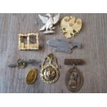 Various gold plated and other badges