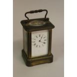 Miniature brass cased carriage clock (dial at fault)