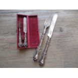 19th Century miniature silver Christening knife and fork in a leather case together with another