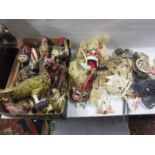 Collection of Indonesian carved and painted puppets and shadow puppets (some with stands)