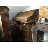 20th Century oak pedestal roll top desk, the roll-top desk, the roll-top having fitted interior with