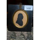 19th Century oval silhouette profile portrait of a gentleman together with a 19th Century copper