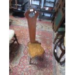 20th Century oak spinning chair with shaped seat on turned supports