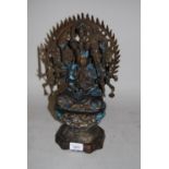 20th Century green / gilt patinated bronze figure of seated Buddha, 14.5ins high