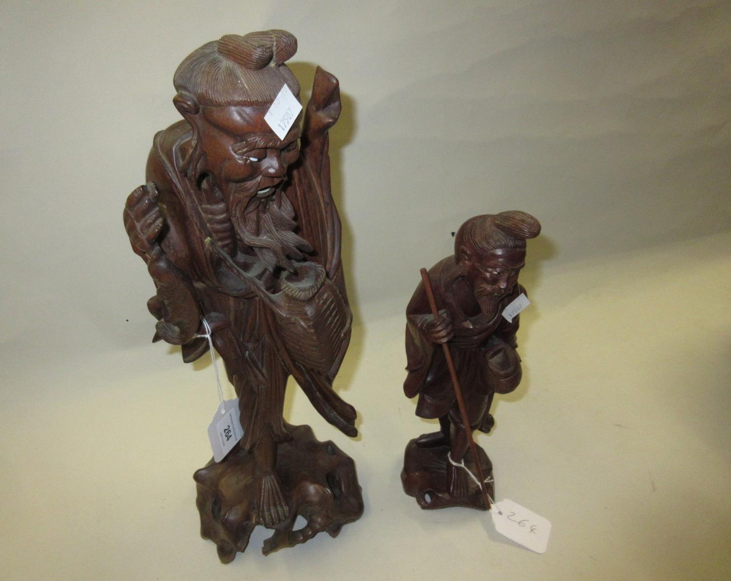 Chinese hardwood carved figure of a sage, 14ins high and another later carved hardwood figure of a