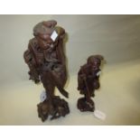 Chinese hardwood carved figure of a sage, 14ins high and another later carved hardwood figure of a
