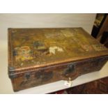 Louis Vuitton large early 20th Century suitcase with brass corner mounts and applied with a large