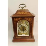 Edwardian mahogany marquetry inlaid bracket clock having brass dial with silvered chapter ring,