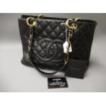 Chanel Caviar black leather Grand Shopping Tote, circa 2005, with authenticity card and original