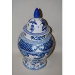 20th Century Chinese blue and white decorated temple jar with cover, 18ins high