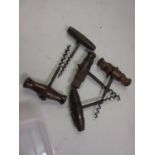 Five various wooden handled corkscrews