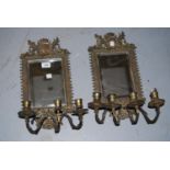 Pair of brass mirror backed candle brackets ( minus one arm) Overall height about 18ins. One