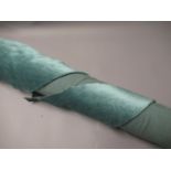 One roll of pale blue upholstery fabric, a box containing a large quantity of velour and similar
