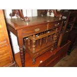 Small Edwardian mahogany writing table with an inset top above two drawers raised on turned