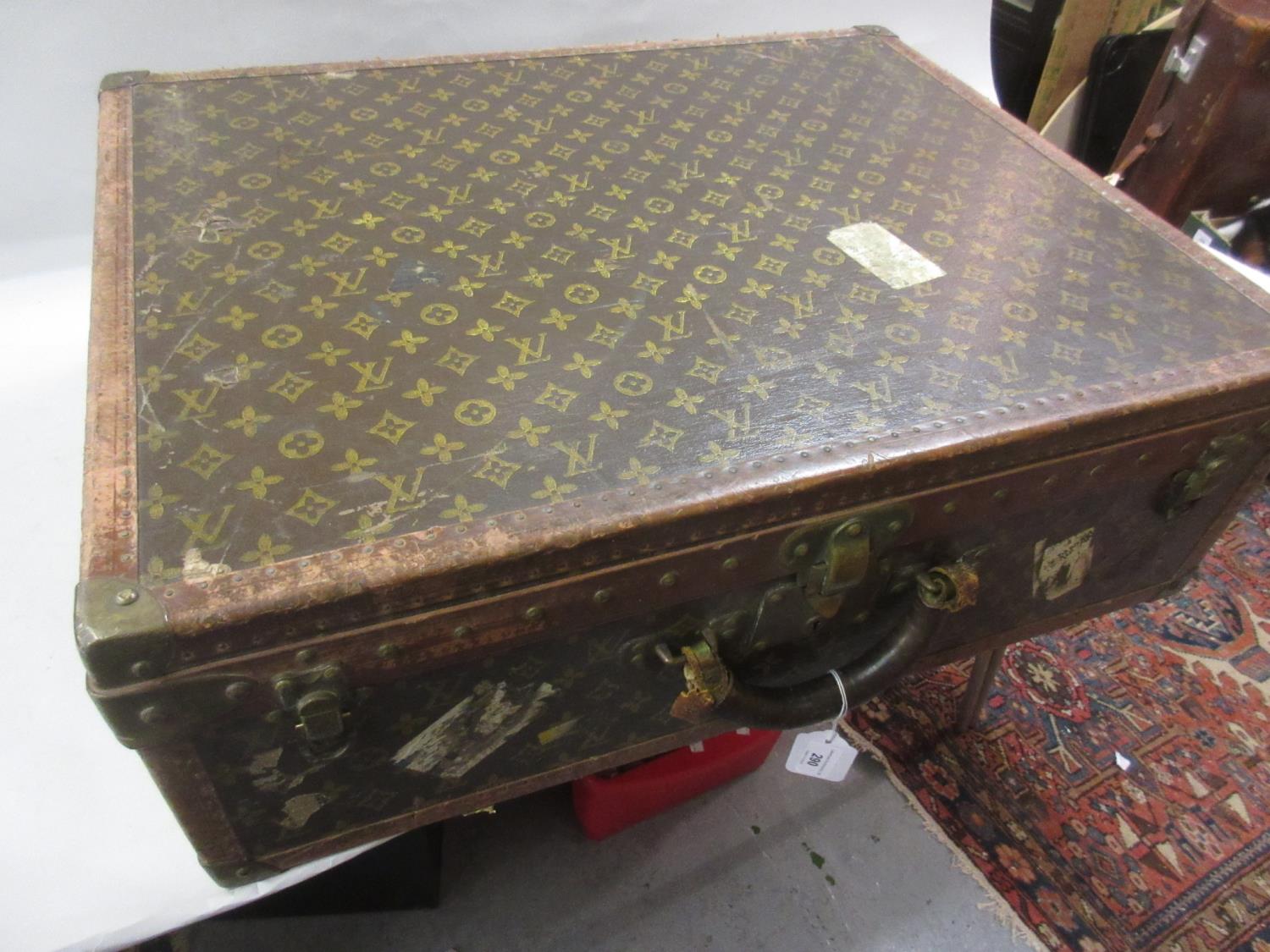 Louis Vuitton, early 20th Century suitcase decorated with the all-over monogram design, the original