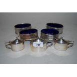 Group of three oval silver mustards, together with a set of four oval silver plated open salts