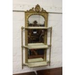 19th Century gilded composition three shelf wall bracket with shell surmount above a mirrored