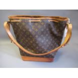 Louis Vuitton, ladies bucket bag with leather strap and leather tie top