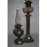 19th Century silver plated on brass Corinthian column oil lamp with glass well, together with