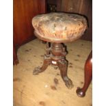 Victorian carved walnut circular adjustable seat piano stool (at fault)