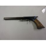 Good quality miniature novelty pistol with wooden stock, 5.25ins long We believe it to be a