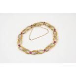 A GOLD, PINK SAPPHIRE AND DIAMOND BRACELET each gold link is divided by a collet set circular pink