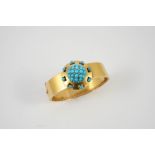 A VICTORIAN GOLD, DIAMOND AND TURQUOISE HALF HINGED BANGLE set to one side with a cluster of