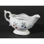 ENGLISH PORCELAIN BUTTER OR SAUCE BOAT, late 18th century, probably Liverpool, painted with floral
