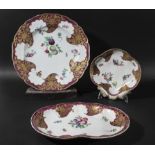 PAIR OF WORCESTER CHARGERS, circa 1770, painted with fruit inside a border of gilt cornucopia on a
