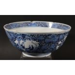 CHINESE BLUE AND WHITE LOTUS BOWL, the interior painted with a bird in a flowering prunus beneath