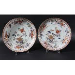 PAIR OF CHINESE IMARI SAUCER DISHES, probably 18th century, of slightly scalloped form, with