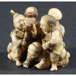 JAPANESE IVORY OKIMONO, modelled as a group of six men and boys, width 4cm