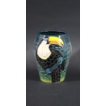 DENNIS CHINA WORKS VASE - TOUCAN a vase designed by Sally Tuffin, painted with Toucan's on a blue