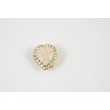 AN OPAL AND DIAMOND WITCHES' HEART BROOCH PENDANT the solid white opal is set within a surround of