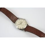 A STAINLESS STEEL SILVER ARROW AUTOMATIC WRISTWATCH BY LONGINES the signed circular dial with