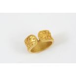 AN 18CT GOLD RING BY LALAOUNIS with embossed rope and ball decoration, maker's mark to the inside,