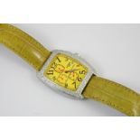 AN ALUMINIUM CHRONOGRAPH WRISTWATCH BY LOCMAN, ITALY the yellow dial with Arabic numerals and date