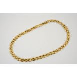 AN 18CT GOLD FANCY LINK NECKLACE BY VAN CLEEF & ARPELS with concealed clasp, signed to the clasp and