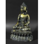CHINESE OR SOUTH EAST ASIAN BUDDHA, seated crossed legged on a double lotus base, gilt heavily