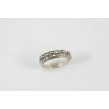 A DIAMOND HALF HOOP TWO ROW RING set to one side with rose-cut diamonds. Size L