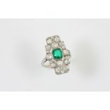 AN ART DECO EMERALD AND DIAMOND CLUSTER RING the cushion-shaped emerald weighs approximately 1.1