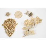 A VICTORIAN SEED PEARL FOLIATE BROOCH together with various other seed pearl brooches and a carved