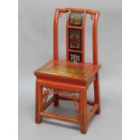 CHINESE ELM AND RED LACQUERED CHILDS CHAIR, the splat with figures, foliage and piercing over a